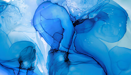 Alcohol ink abstract background. Blue and white liquid texture. Fragment of artwork.の素材