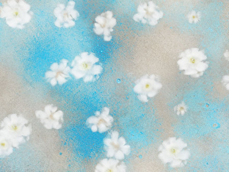 Cherry blossom petals on pastel blue and white backgroundの素材