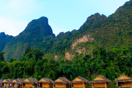 Boat house hotel floating in the dam Suratthani, Thailand 