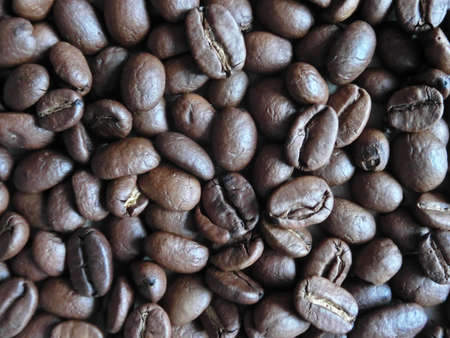 Background of roasted coffee beans close upの写真素材