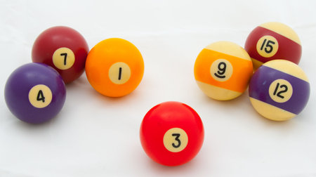Depicting the idea of three(3) with pool balls