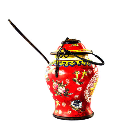 Isolated antique ceramic on white background with clipping path for design elements. It is older...