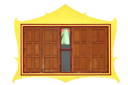 Window to the outside with a layer of plaster. Then painted yellow. The contrasting view is beautiful.の写真素材