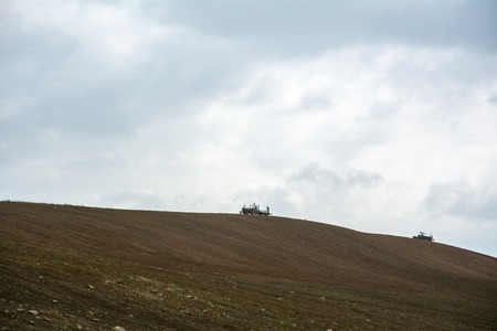 Corn farming in the uplands. Agricultural tractor isの写真素材