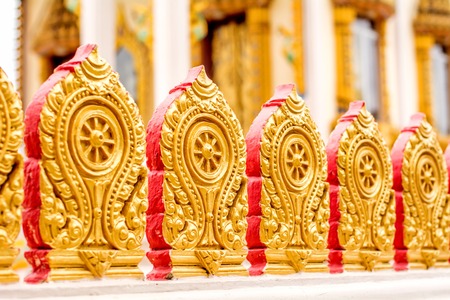 Adhering on the wall of the church stands a beautiful small baysの写真素材