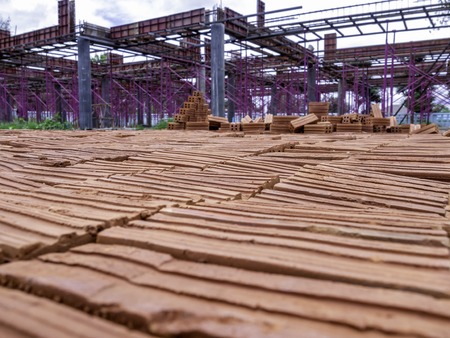 Red bricks made from clay that has been burned to the hardness. Used in general constructionの写真素材