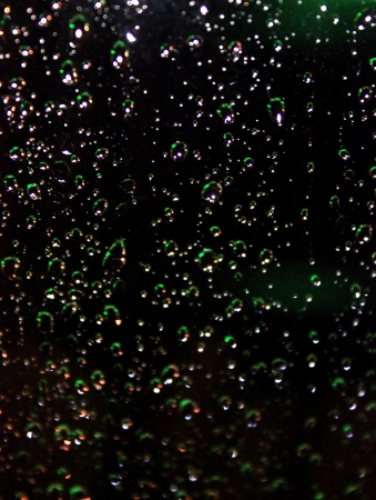 Water droplets on glass の写真素材