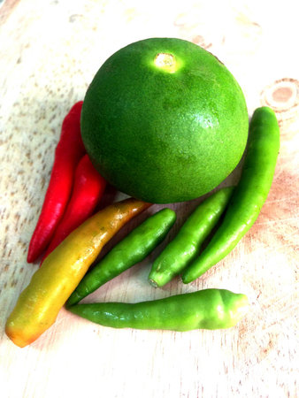 Hot chillies with lemonの写真素材
