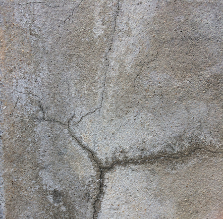 Water out of the cracks of the cement walls.の写真素材