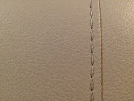 Seam depicted on a leather sofa.の写真素材