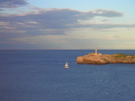 Lighthouse in Mouro island (Santander, Spain).の写真素材
