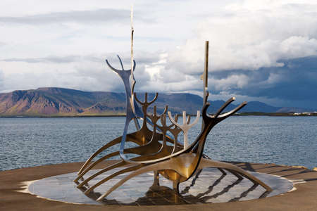 REYKJAVIK, ICELAND - AUGUST 1: The Solfar sculpture (Sun Voyager) is on display at the waterfront, north of Reykjavik city center, on August 1, 2014 in Reykjavik, Iceland. It is created by Jon Gunnar Arnason in 1971.のeditorial素材