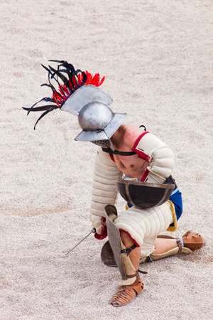 Tarragona, Spain - May 19, 2013: Gladiators on the arena of Roman Amphitheater on May 19, 2013 in Tarragona, Spain. Every year, the historic recreation program TarracoViva recreates a gladiators fightのeditorial素材