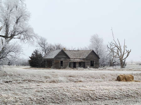 Old Abandoned Homestead in the Dead of Winterの写真素材