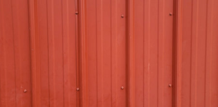 Close Up Exterior Wall of a Red Rural Outbuildingの写真素材