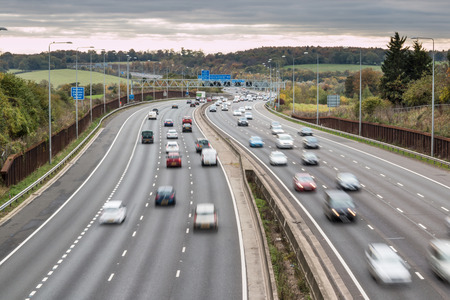 LONDON, UK - 07 NOVEMBER 2016: British motorway M25 in a grey cloudy dayのeditorial素材