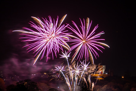 St. Alban, UK - November 03, 2018: Fireworks display in Verulamium Park as a part of celebration of Bonfire night. In the background St. Albans Cathedral.のeditorial素材