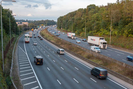 London, UK - September 20, 2021: British road transport. Evening traffic on busiest British motorway M25のeditorial素材