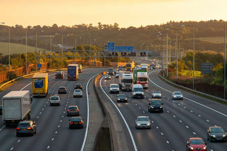 London, UK - September 20, 2021: British road transport. Evening traffic on busiest British motorway M25のeditorial素材