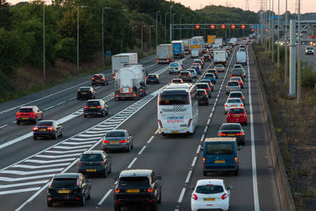 Watford, UK - September 23, 2021: British road transport. Afternoon traffic jam on British motorway M1.M25M1 junction.のeditorial素材