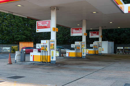 Hemel Hempstead, UK - September 27, 2021: Due to national shortage of lorry drivers and panic buy many petrol stations across UK run out fuel. Empty Shell petrol station with pumps out of fuel.のeditorial素材