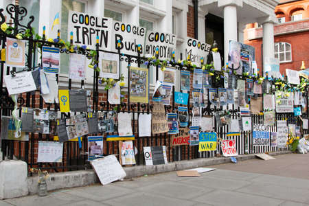 London, UK - March 17, 2022: Anti war and anti Vladimir Putin protests outside of Russian Federation consular section building in London.のeditorial素材