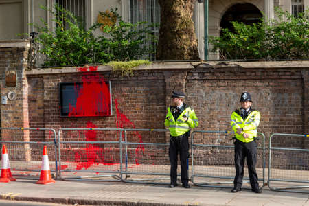 London, UK - March 17, 2022: Russian Federation embassy in London with red paint spread over the...