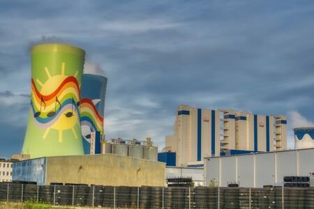 panoramic view of the Opole power plant with visible new and old power units, chimneys and cooling towerの写真素材