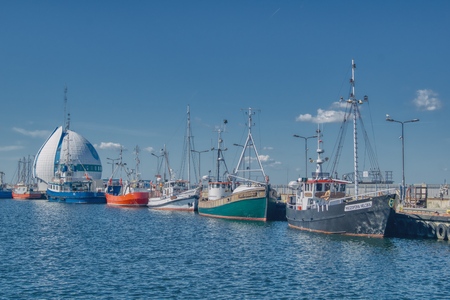 Hel, pomorskie/Poland-06-09-2019 sunny day, fishing vessels in the port of Hel on Sunday morning, waiting for the fishing crew before setting sail, sea without waves, port without people, catch limitsのeditorial素材