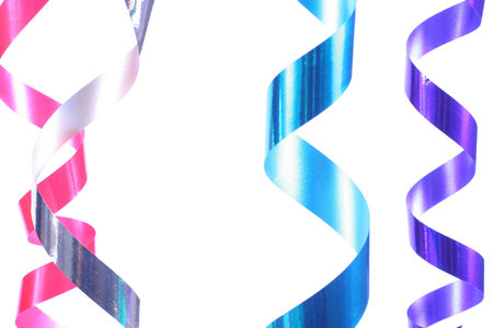 Shiny colorful satin ribbons hanging in curls. Holiday, celebration, の写真素材