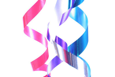 Shiny colorful satin ribbons hanging in curls. Holiday, celebration, の写真素材