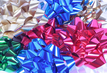Shiny colorful satin bows. Holiday, celebration, party theme.