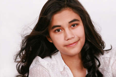 Beautiful teen girl smiling, part Thai - Scandinavian descentの写真素材