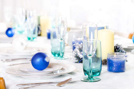 Christmas table set in blues and whitesの写真素材