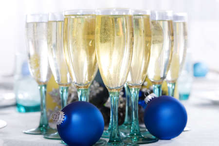 Flute wine glasses with drinkの写真素材