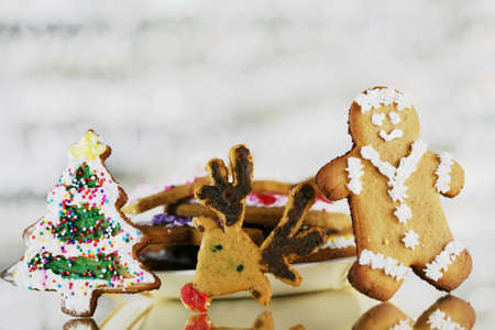 Decorated Gingerbread cookies  with silver background lightsの写真素材