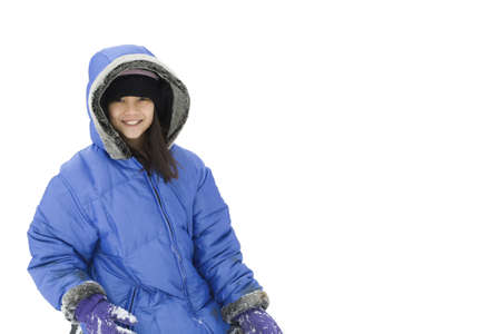Girl playing in the snowの写真素材