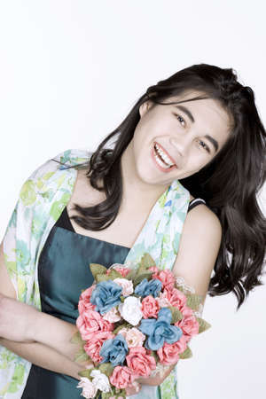 Bridesmaid holding bouquet of flowersの写真素材