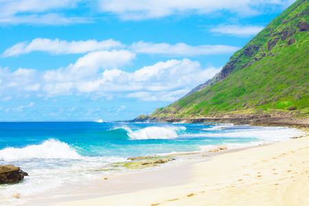 Beautiful landscape of the  Hawaiian coastline, waves crashing on beachの写真素材