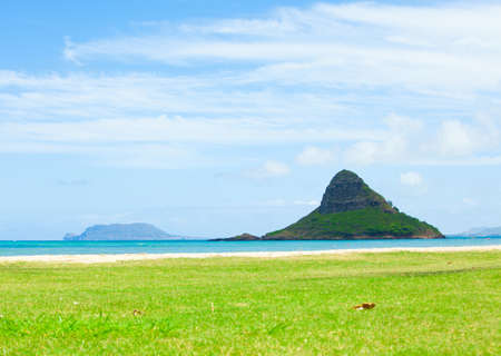 Islet of Mokoli'i, known as Chinaman's Hat, near Kaneohe at Kualoa Regional Parkの写真素材