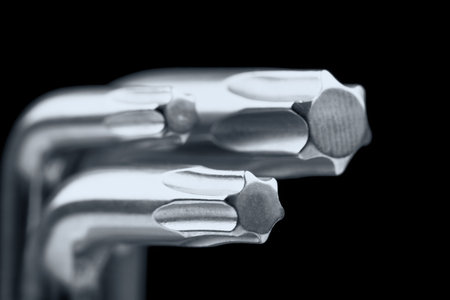 Several different size of Torx keys and black background 
