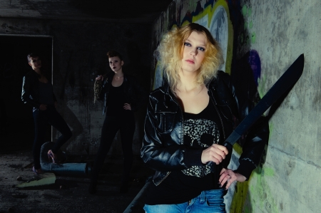 Self-confident guard blond has equipped with a machete, horizon formatの写真素材