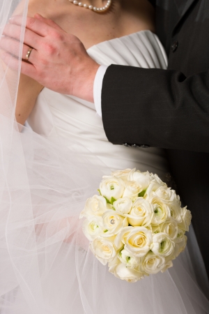 Bridal Bouquet, bride and groom close togetherの写真素材