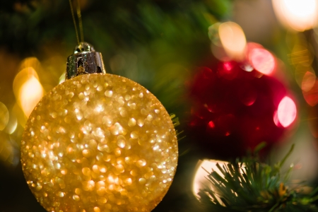 Christmas decorations, focus on ball, soft and warm christmas coloursの写真素材