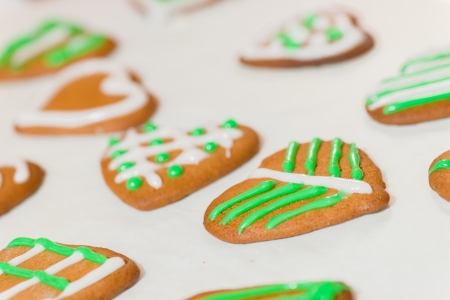Decorated gingerbread cookie by sugar, parchment belowの写真素材