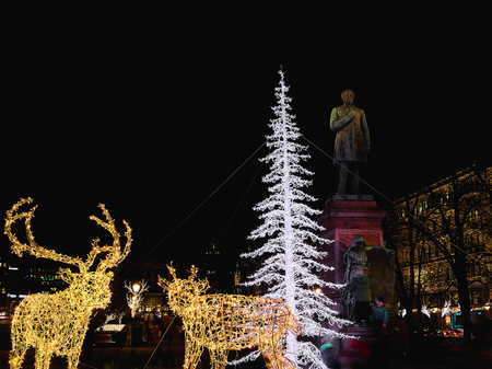 HELSINKI, FINLAND - DECEMBER 22, 2015: Christmas lights in Esplanade Park in the evening.のeditorial素材