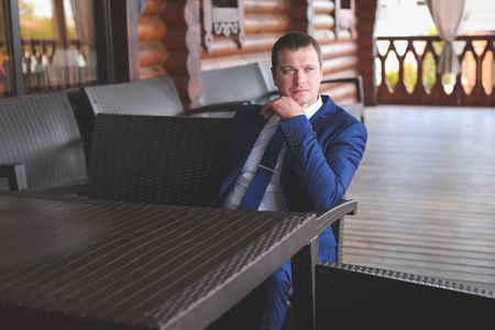 Young bride and groom walk in nature on the wedding dayの写真素材