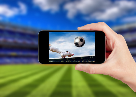 football game on mobile phoneの写真素材