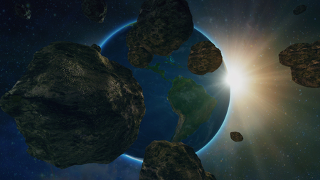 asteroid or meteorite flies in space, on the background of the planet earthの写真素材