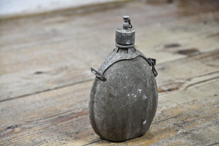 vintage old army bottle on the wood floorの写真素材